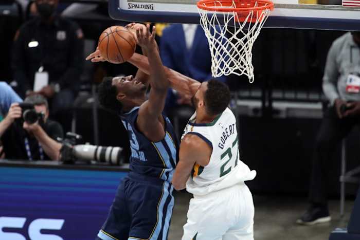 Rudy Gobert (27) blocks a shot from Jaren Jackson Jr (13) 